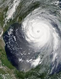 A satellite view of a hurricane

Description automatically generated